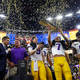 Illustration for article titled NCAA Robs Predominantly Black Football Basketball Players of Billions in Generational Wealth — Damning Study Shows Athletes Deserve $1 Million Over Four Years